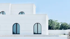 white arched building facade