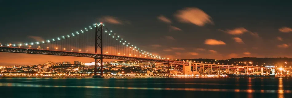 25 De Abril Bridge At Night