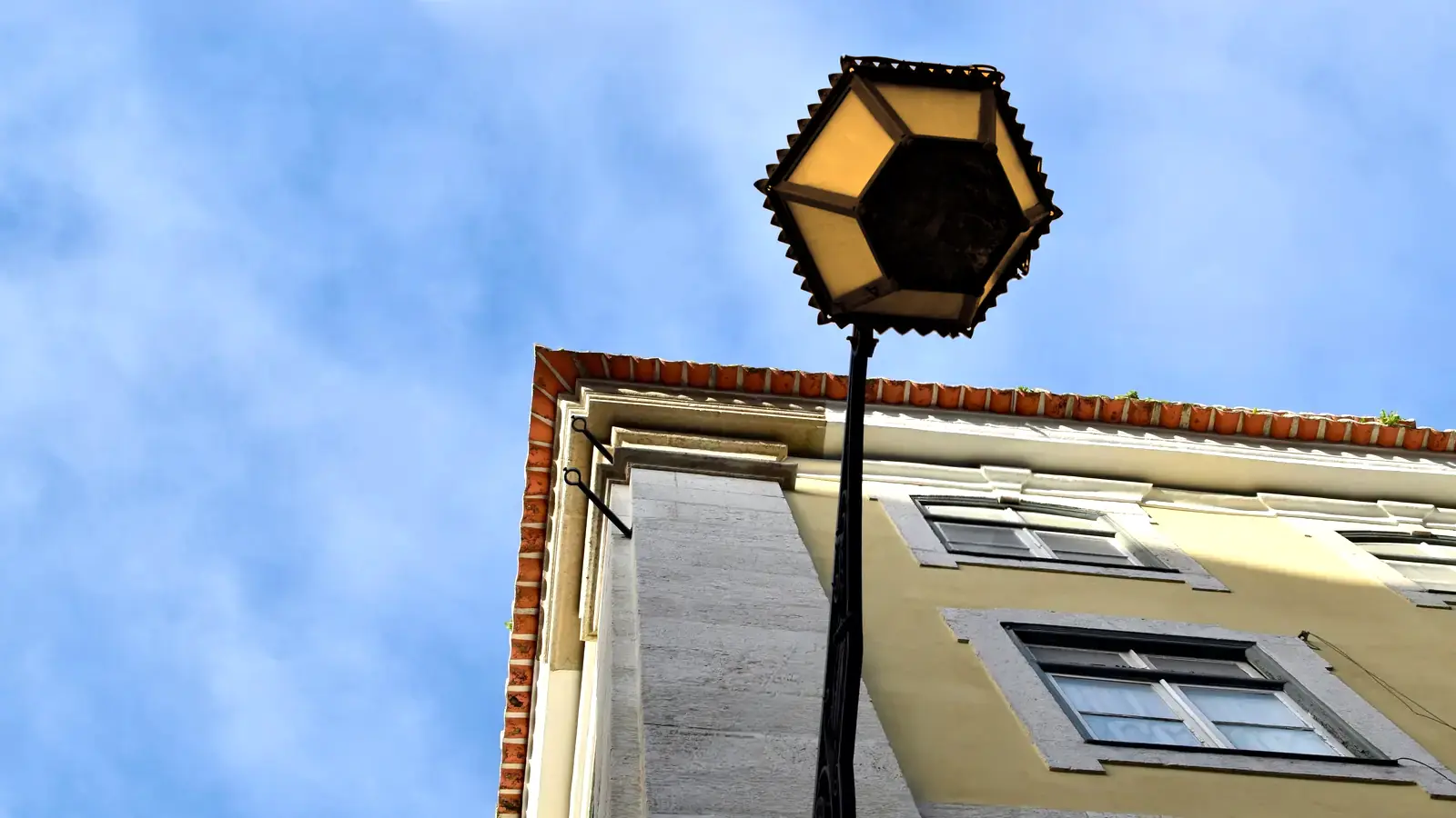 Lisbon Street Lamp On Building
